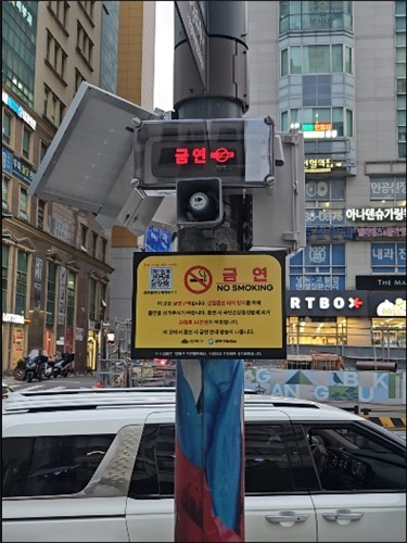 담배 연기 앞의 망설임, 강북구 '금연벨'을 눌러주세요