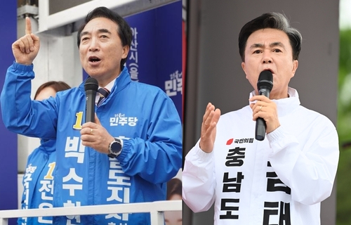 박수현 후보(왼쪽)와 김태흠 후보